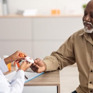 How can I encourage my elderly parent to use a medical alert device?