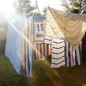 How often should you actually wash your bed sheets? (Plus expert tips for doing it right)