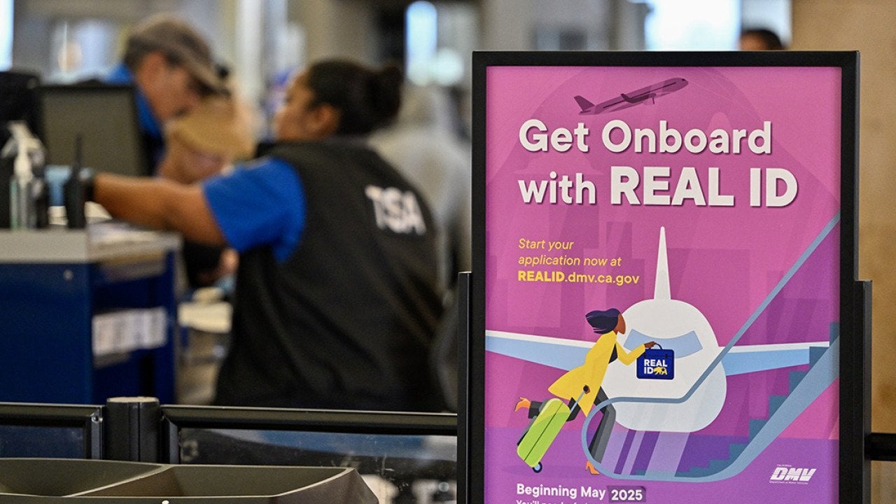 Air travelers go though TSA security at John Wayne Airport in Santa Ana, California.