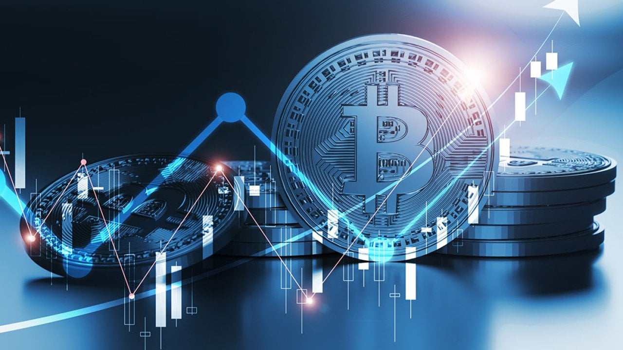 Concept of bitcoin value fluctuations illustrated by image of chart trending prices going up and down overlaid on a bitcoin illustration.