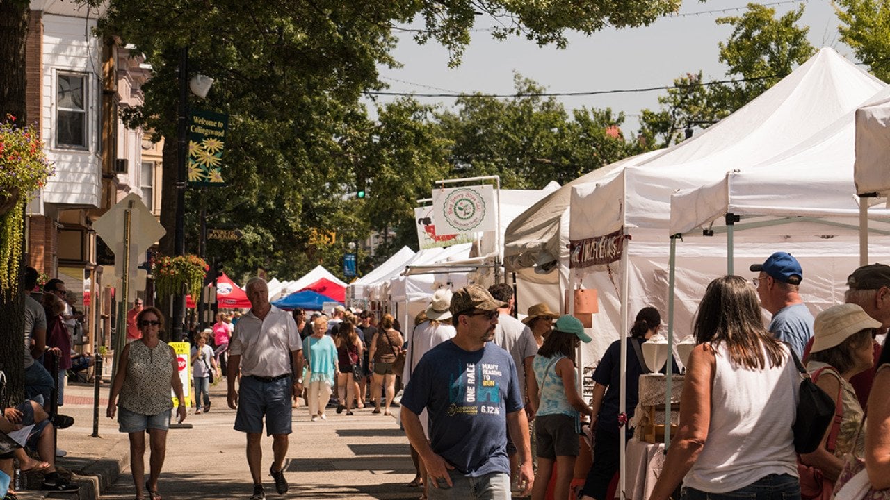 Customers and vendors at The Collingswood Craft and Fine Art Festival in New Jersey.