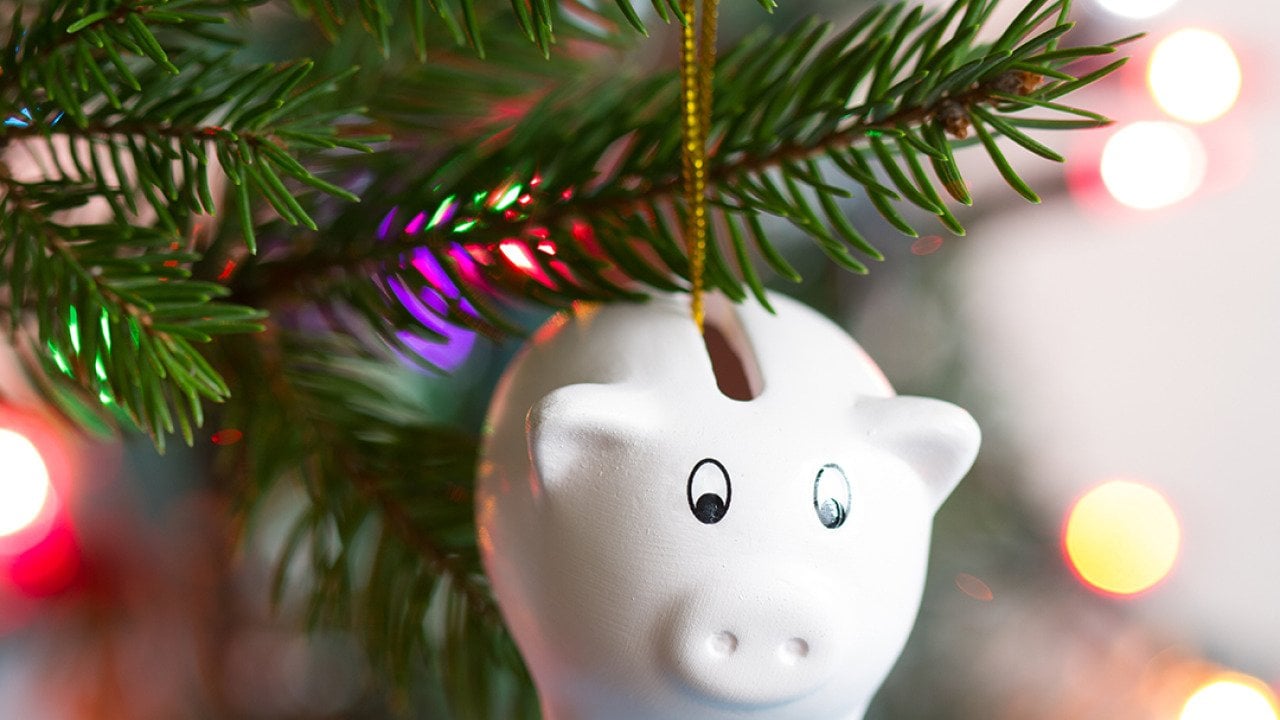 Piggy bank ornament on a Christmas tree.