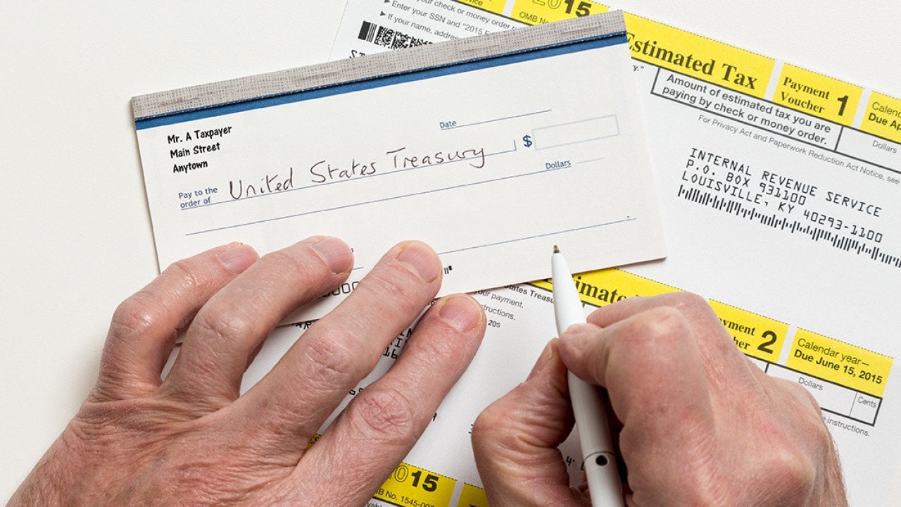 Taxpayer writing a check to the U.S. treasury.