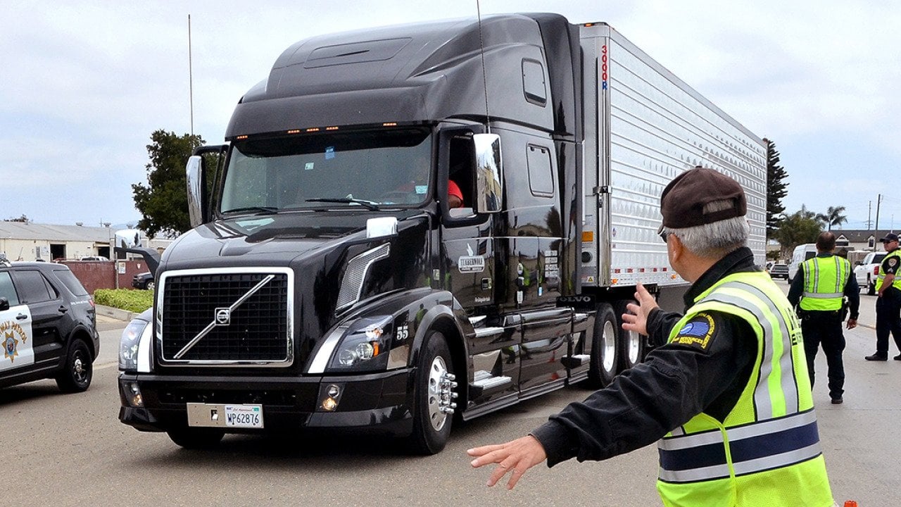 A big rig being pulled over by inspectors during a surprise inspection in Santa Monica, California.