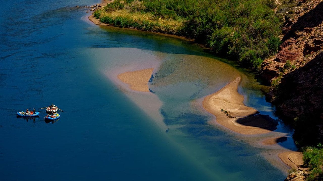 Rafts on the Colorado River as seen from Navajo Bridge in Ariz. on Tuesday, May 20, 2025.