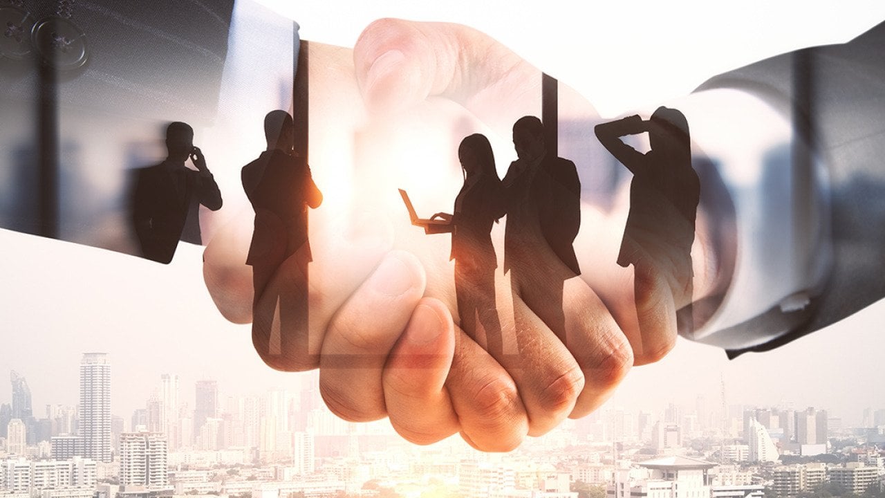 Illustration of businesspeople and a handshake.