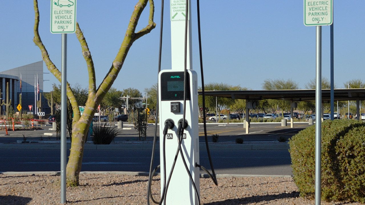 An Autel electric car charging station located at a business district.
