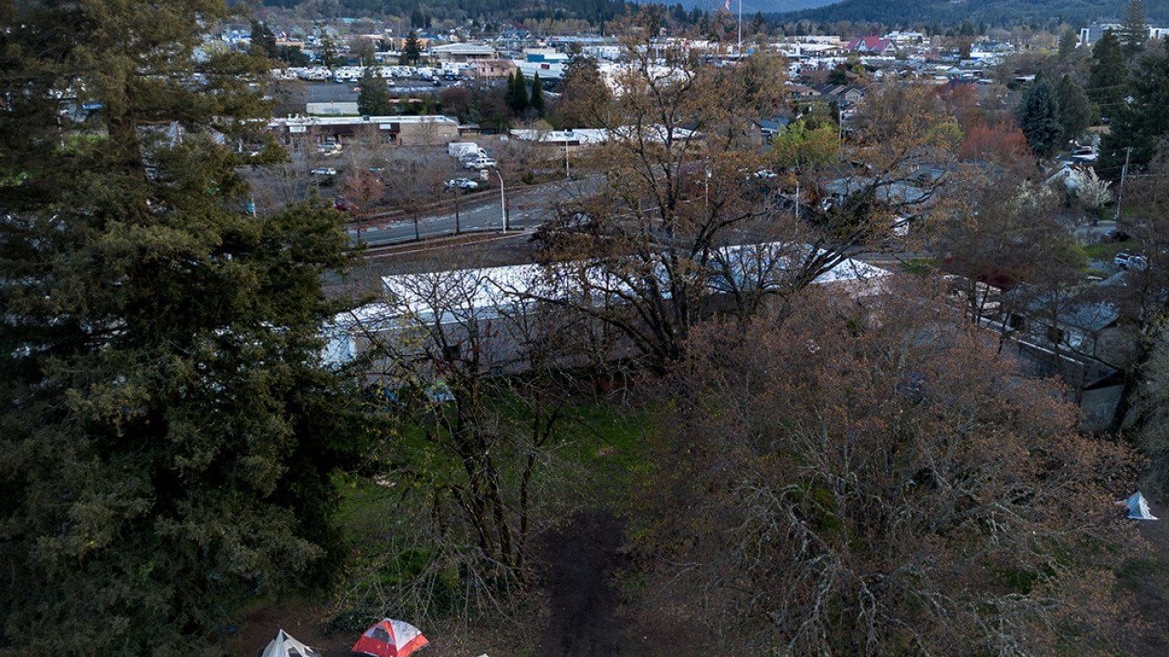 Unhoused people have set up a tent community at Riverside Park in Grants Pass, Oregon.