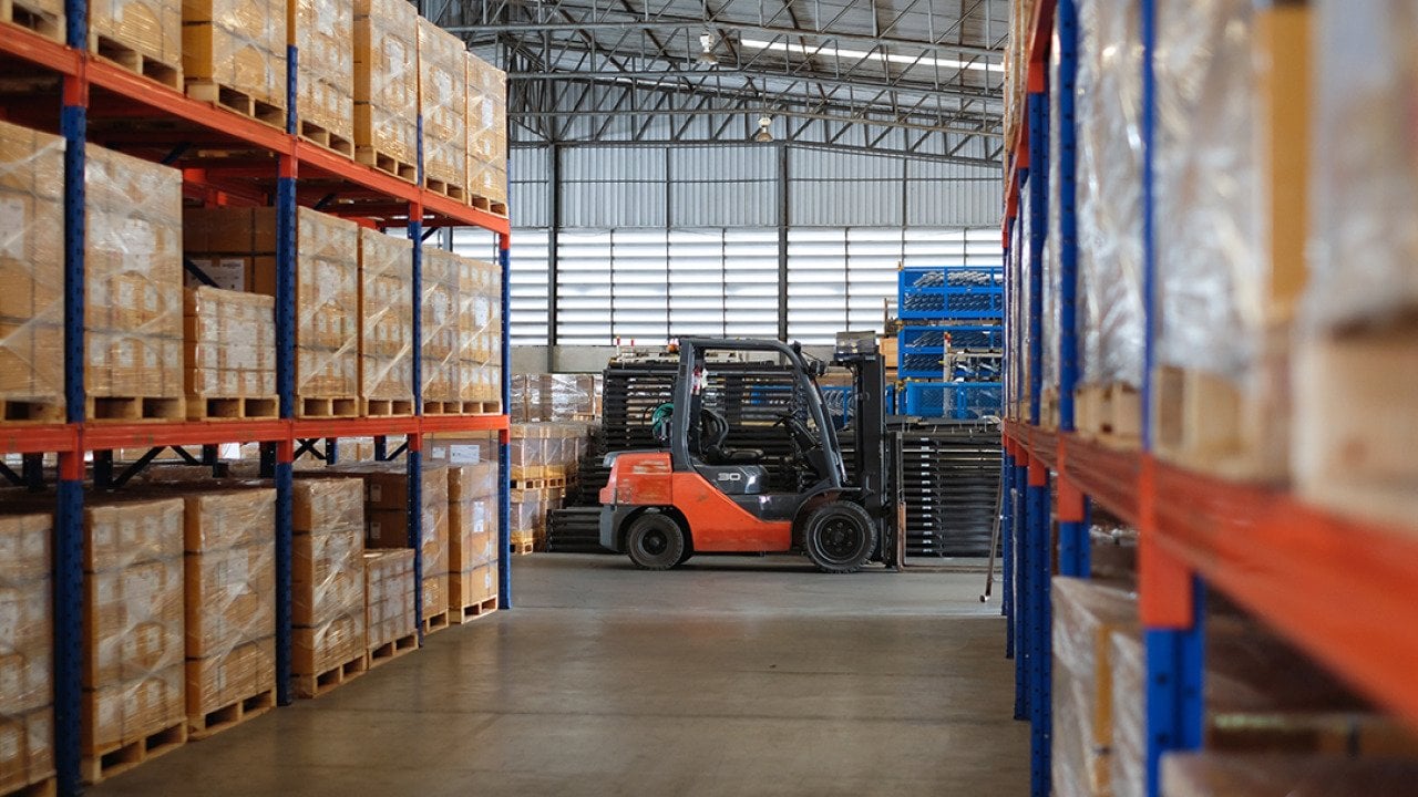 Interior of a modern auto parts factory or warehouse.