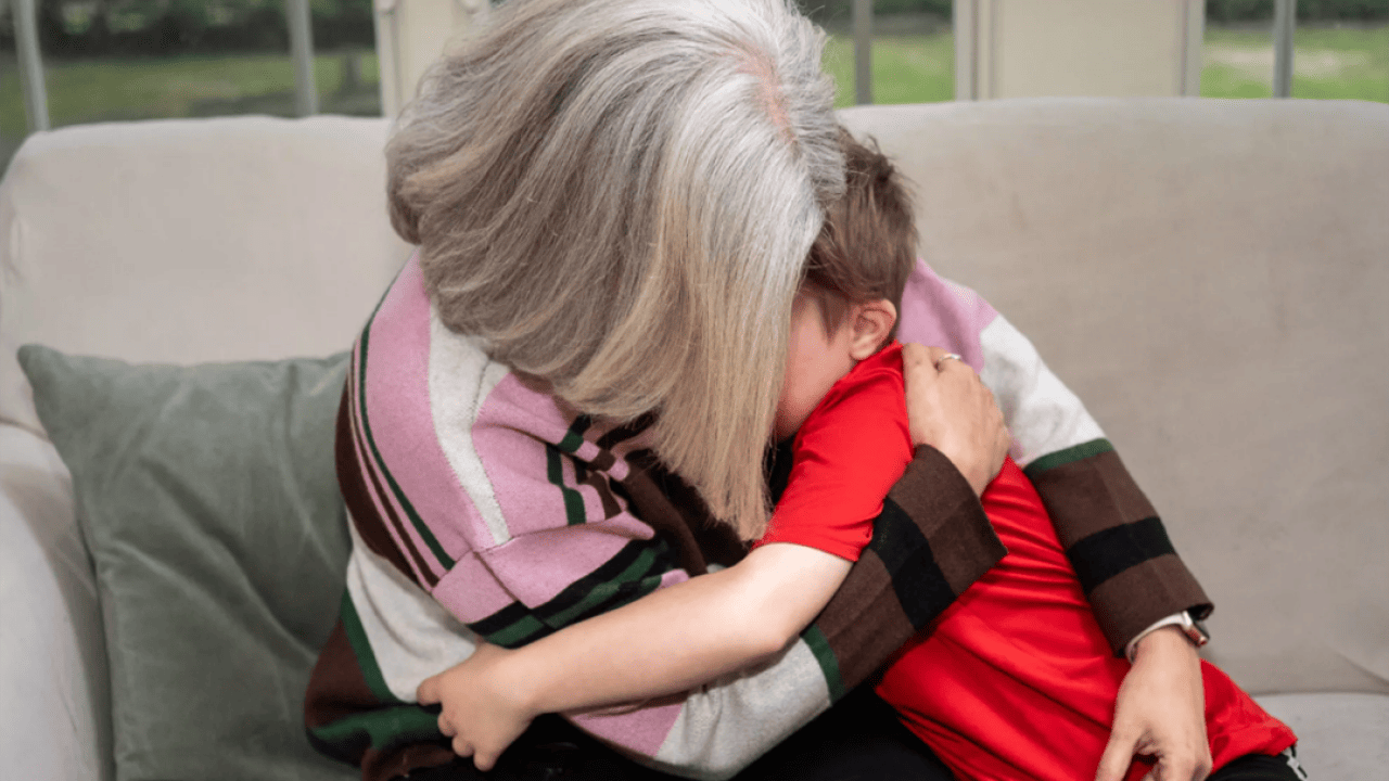 Terri Joyce hugging her son.