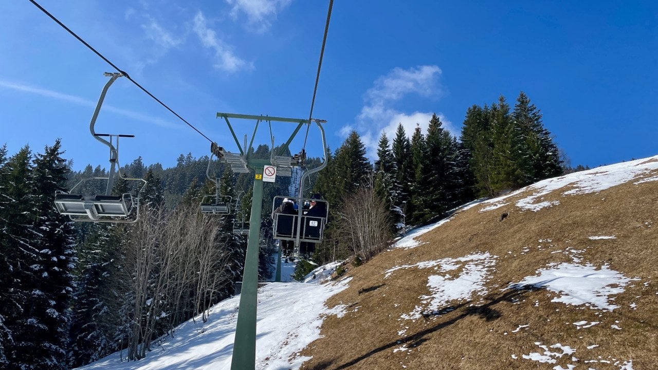 Skiing slopes with little to no snow even in winter due to climate change.