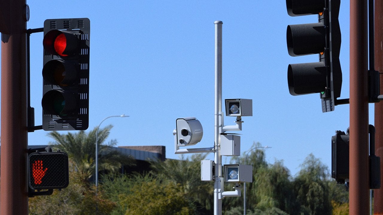 Enforcement cameras along traffic lights.