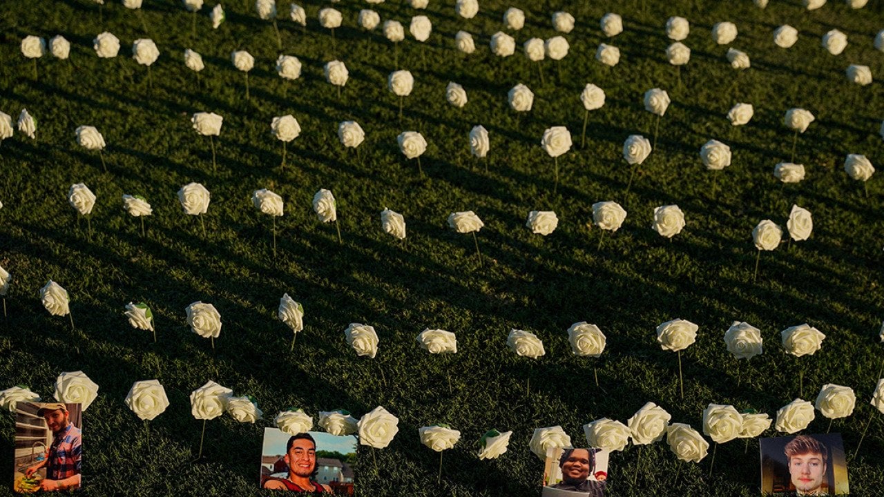 Pictures of loved ones lost to gun violence are displayed during a vigil in honor of victims of gun related deaths at Public Square Park in Nashville, Tennessee.
