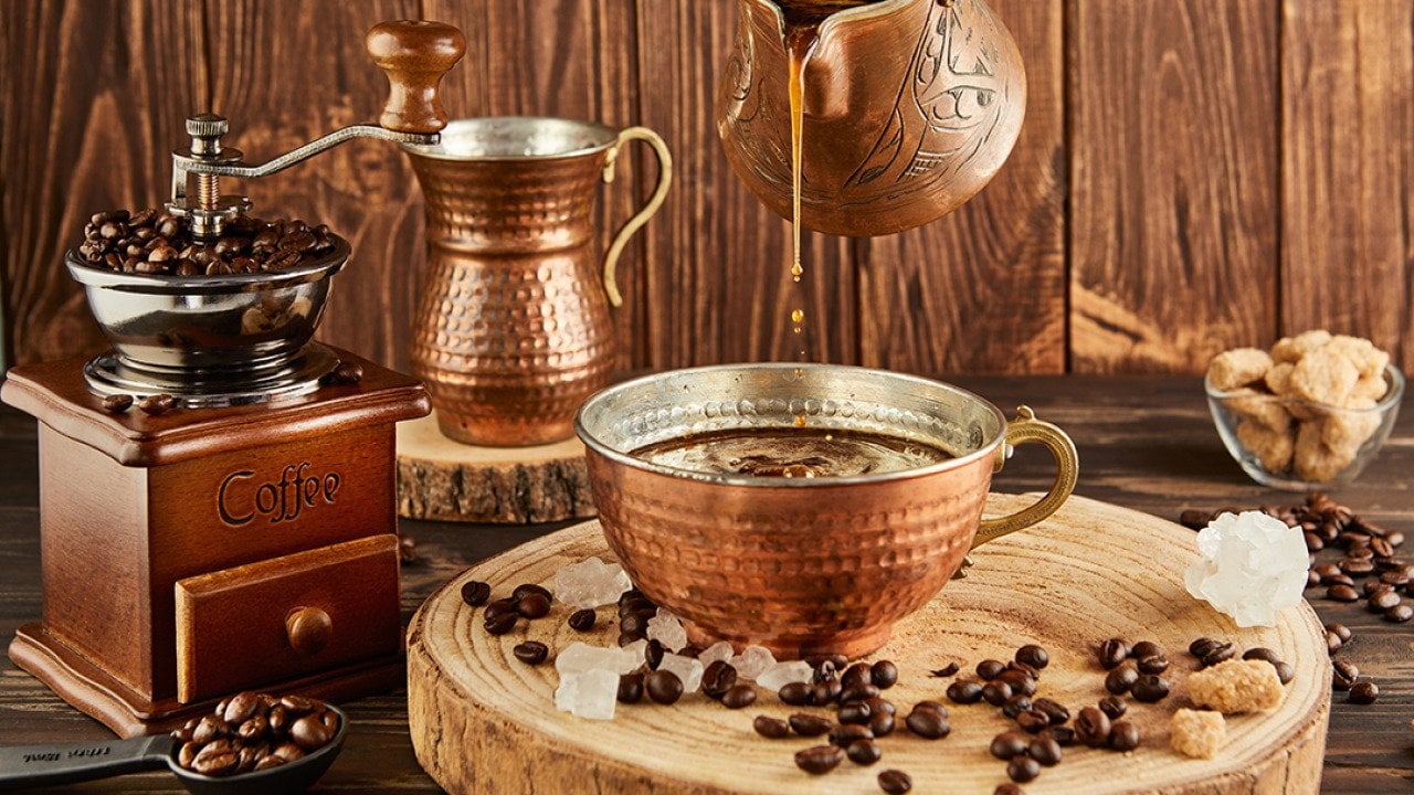 A set of copper coffee set tools.