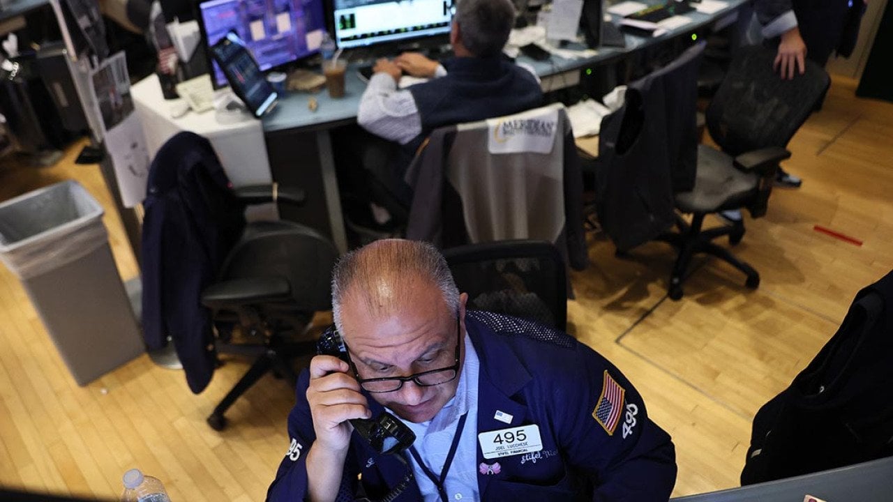 Traders work on the floor of the New York Stock Exchange during morning trading on September 17, 2025 in New York City when stocks were on the rise during the market open in anticipation of an interest rate cut.