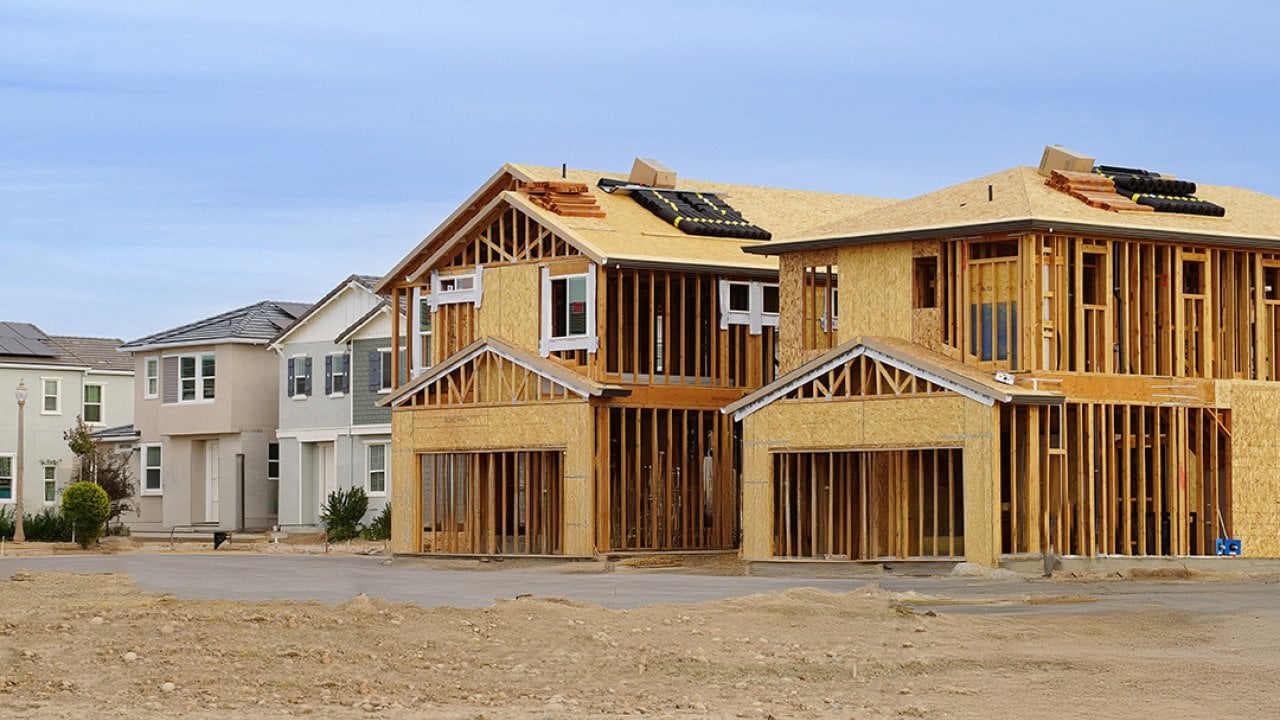 A row of finished homes and a few still under construction.