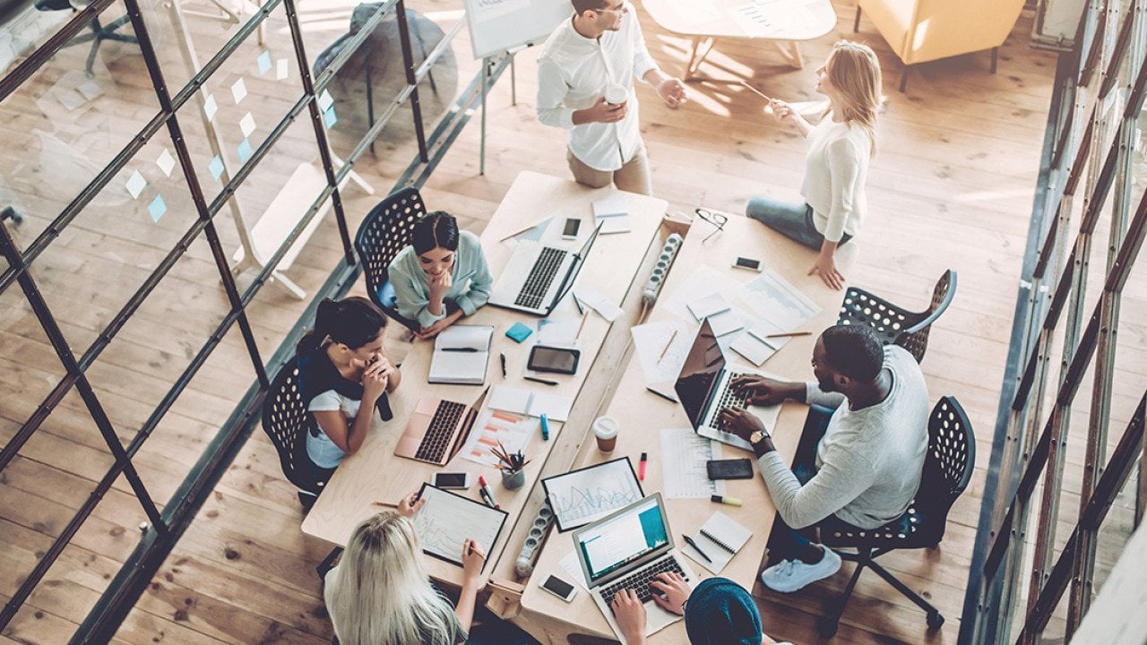 High-angle view of a creative business team in a meeting.