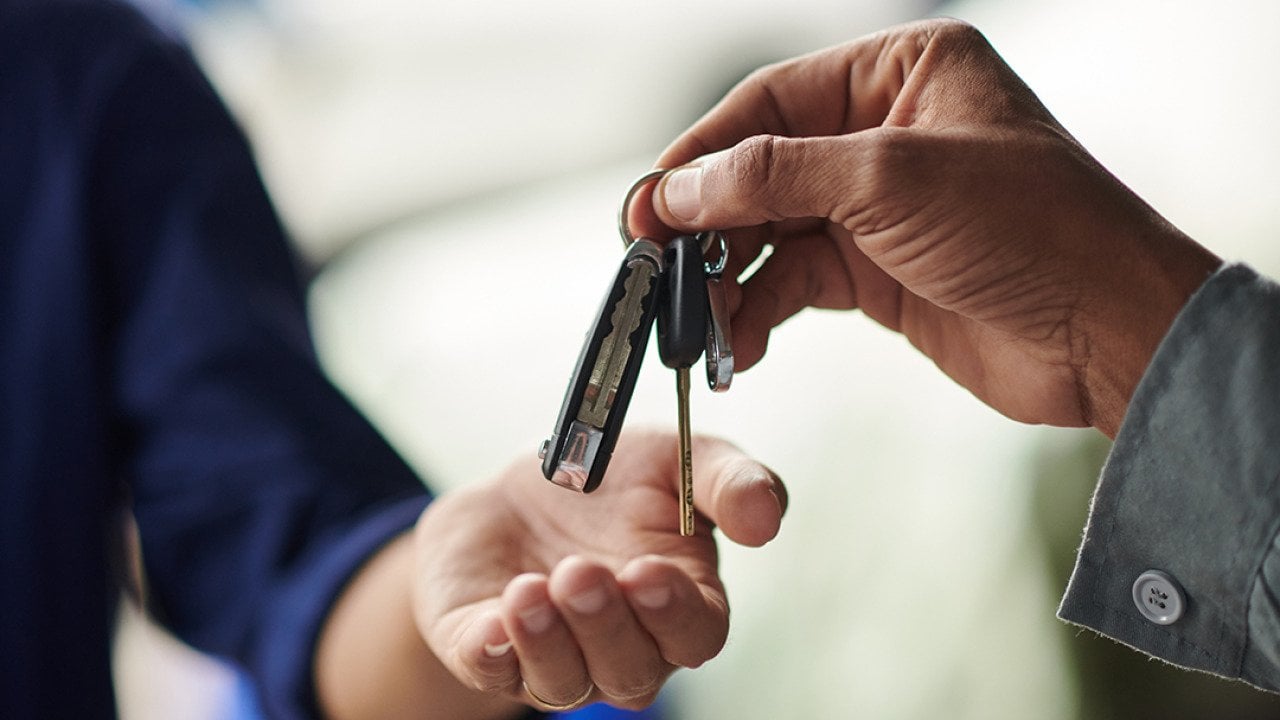 Car keys passed on to an owner.
