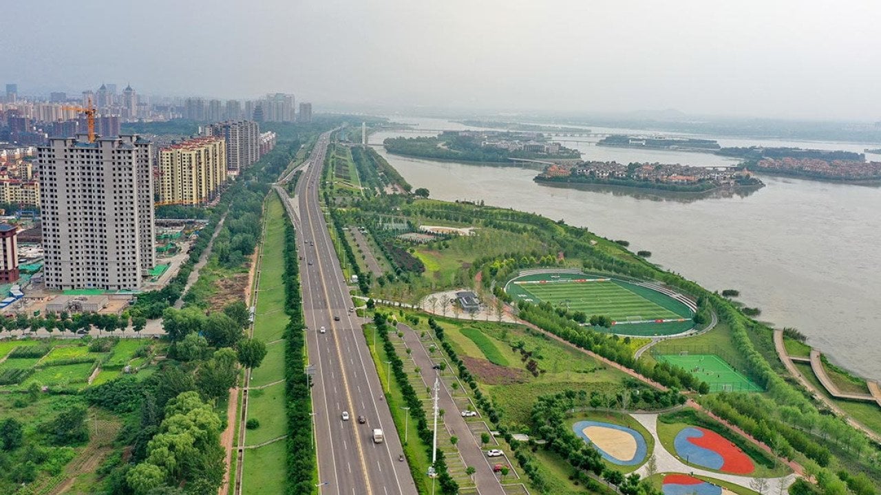 Aerial photo taken on July 31, 2021 shows a vegetation buffer belt at the Huangtaihu Lake water conservation scenic spot in Qian'an City of north China's Hebei Province, as an example of 