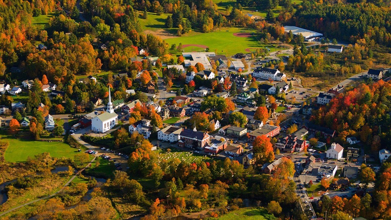 Aerial view of a rural village in Stowe, Vermont during fall.