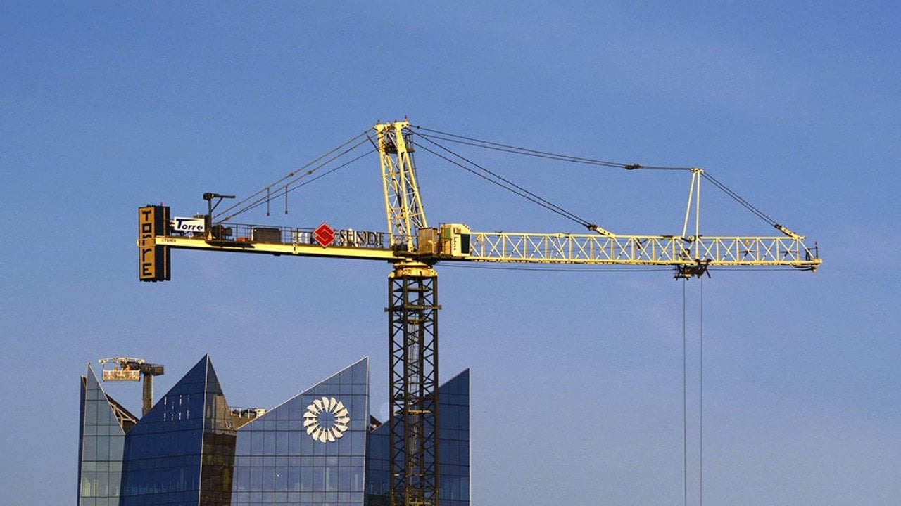 A tower crane owned by Torre Cranes in operation in downtown San Antonio, Texas.