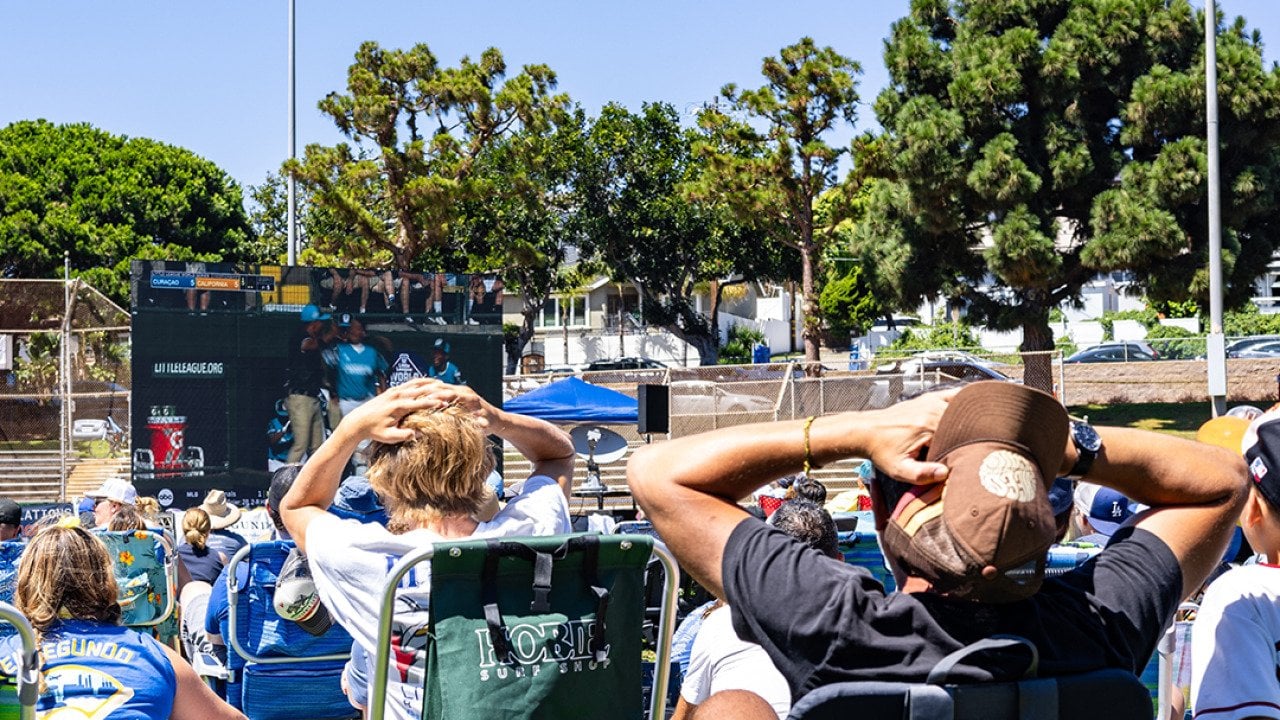 Audience put their hands on their heads in shock at the 2023 Little League World Series in El Segundo, California.
