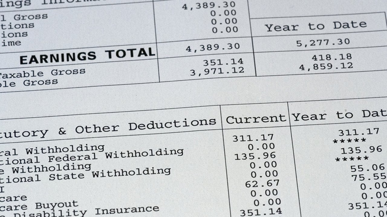 A close up view on a pay stub.