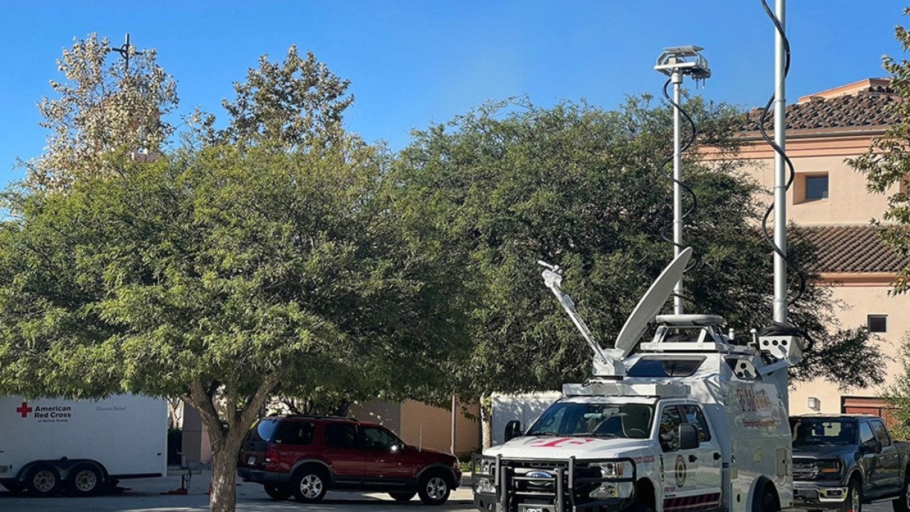 A T-Mobile SatCOLT or Satellite Cells on Light Truck parked on an American Red Cross lot.