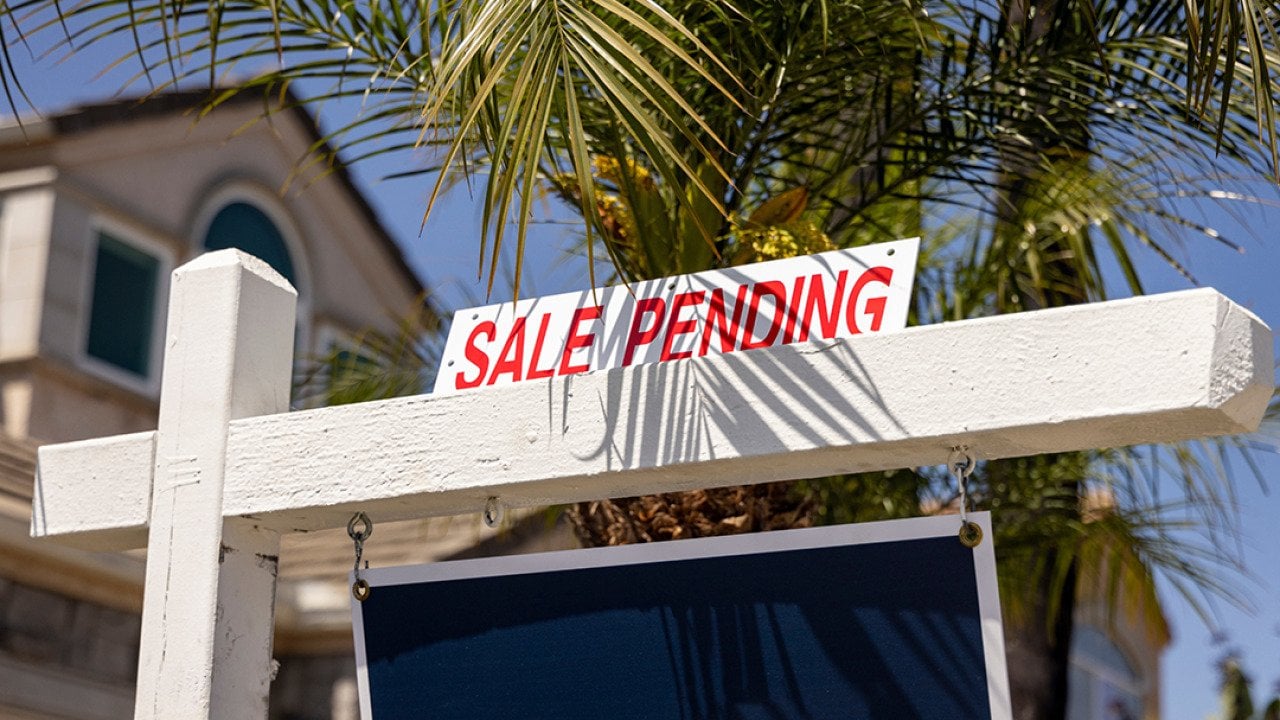 A 'sale pending' sign on a property.