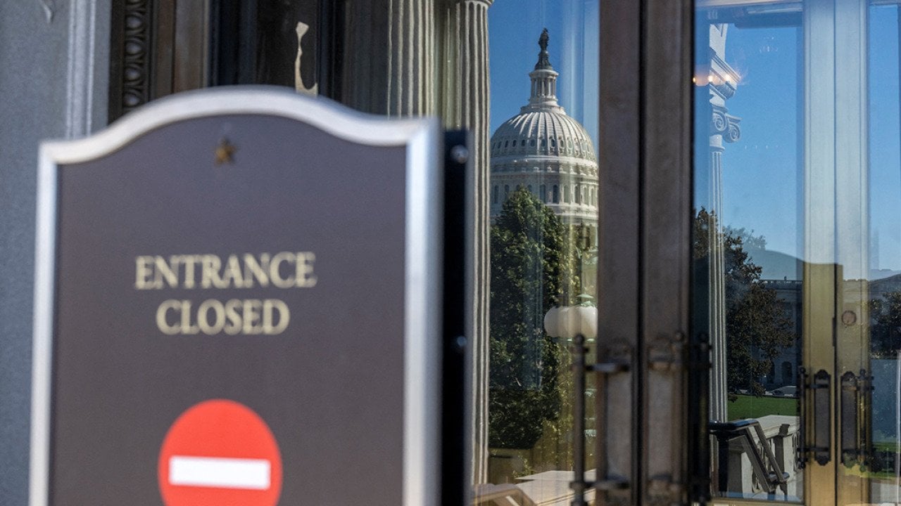 An 'entrance closed' sign at the Library of Congress in Washington, DC, is closed on October 21, 2025 due to the US government shutdown.