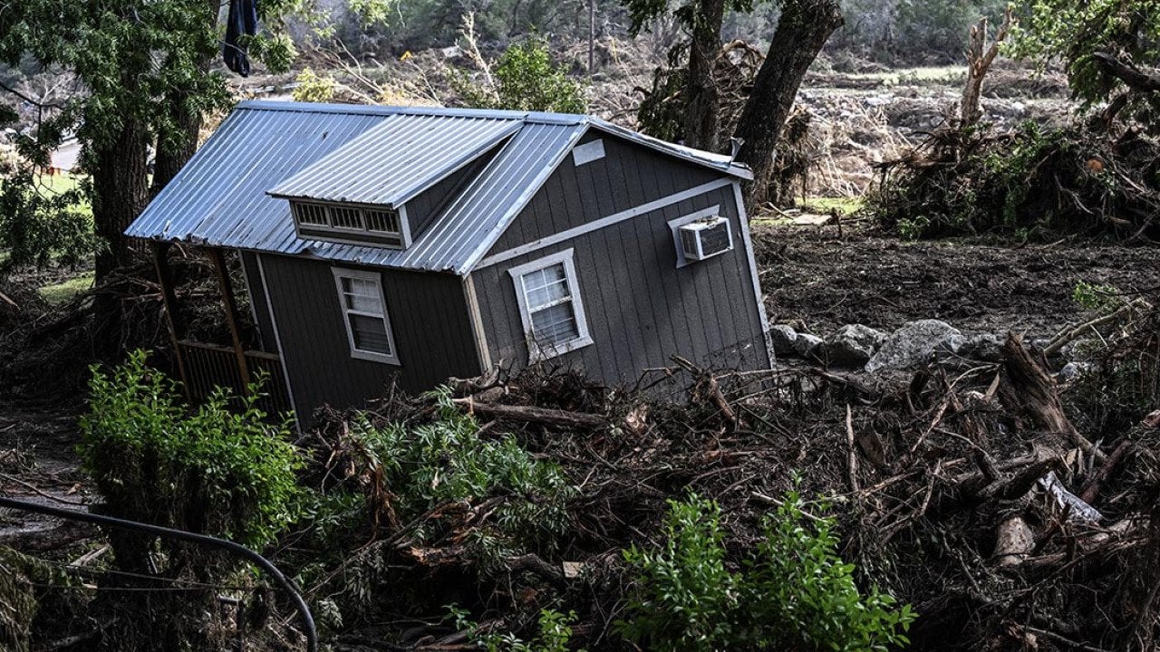 A damaged house is seen near the Guadalupe River in Hunt, Texas, on July 8, 2025, following severe flash flooding over the July 4 holiday weekend.