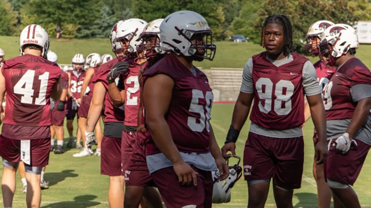 Roanoke College's football players during a practice drill.