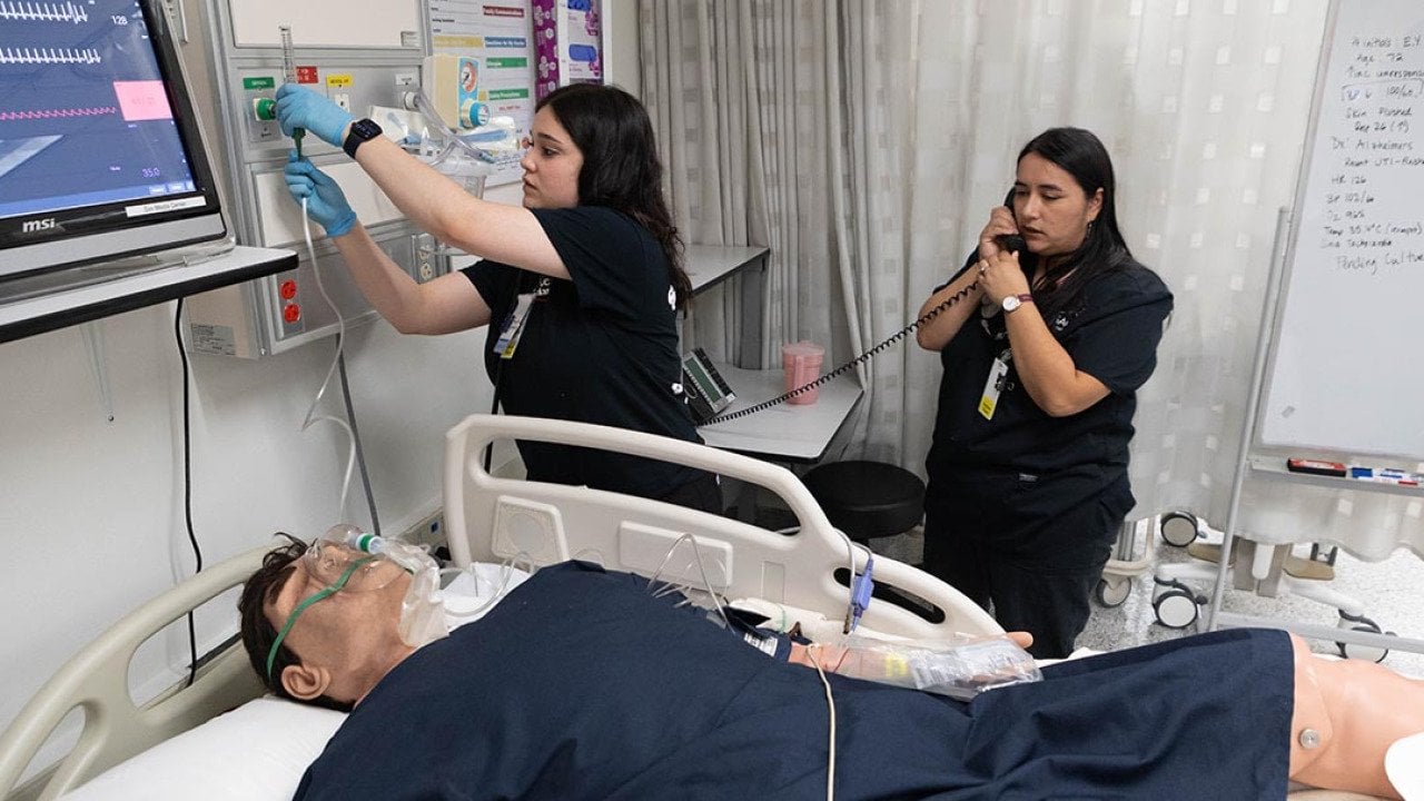 Students practice with a mannequin simulating a patient at the Mt. San Antonio College campus in California.