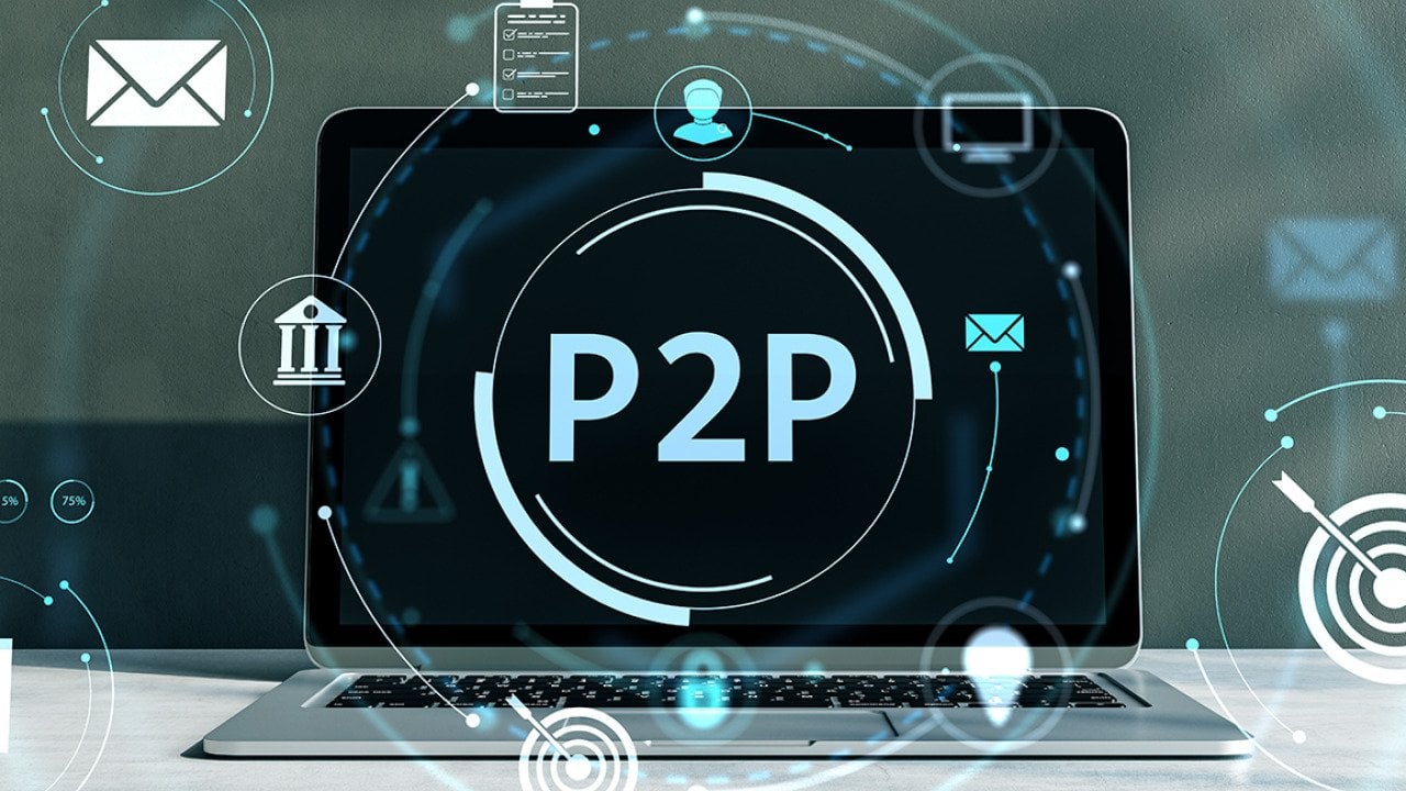 A laptop displaying the word 'P2P', illustrated with technology graphics.