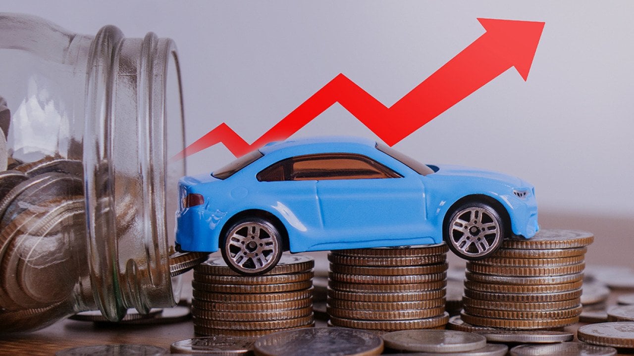 Increase price of car depicted by a small figure of a car over a stack of coins with a red upwards arrow.