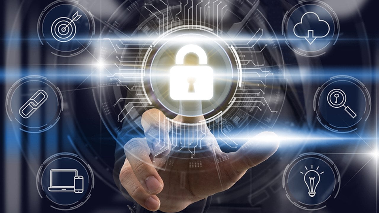 A businessperson touching a lock icon as part of a cybersecurity technology software graphic.