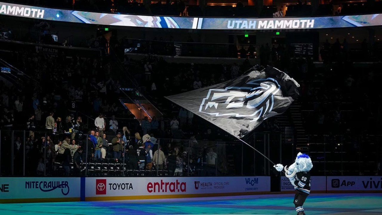 Tusky, the mascot for Utah Mammoth, waves a flag at center ice after the game against the San Jose Sharks at Delta Center in Salt Lake City on Friday, Oct. 17, 2025.