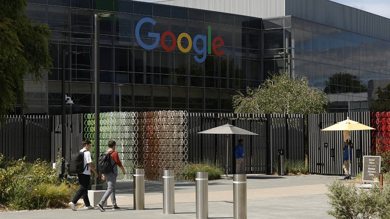 orkers enter a building on the Google headquarters campus in Mountain View, California.