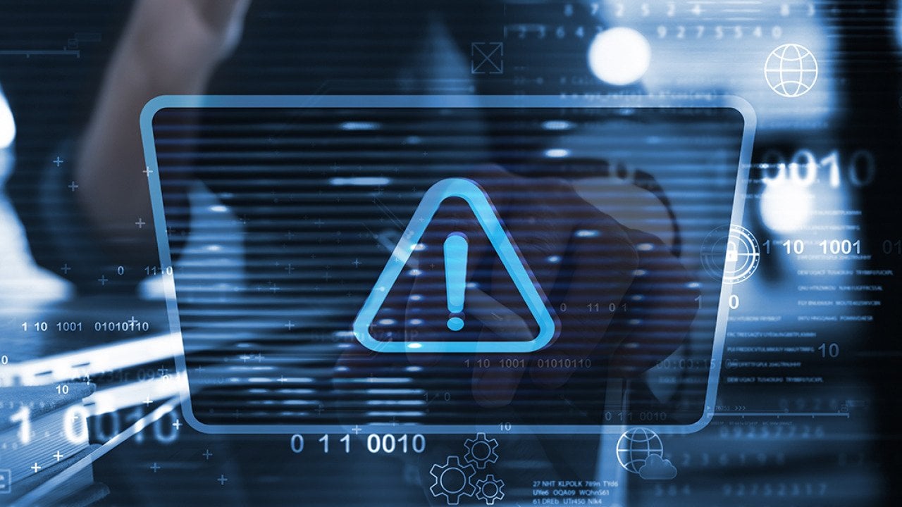 Cybersecurity software graphics displayed in front of a user.