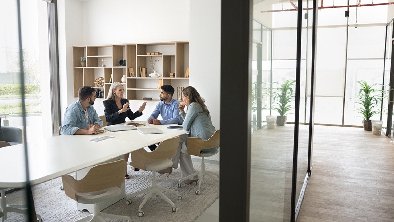 A team of managers in a meeting.