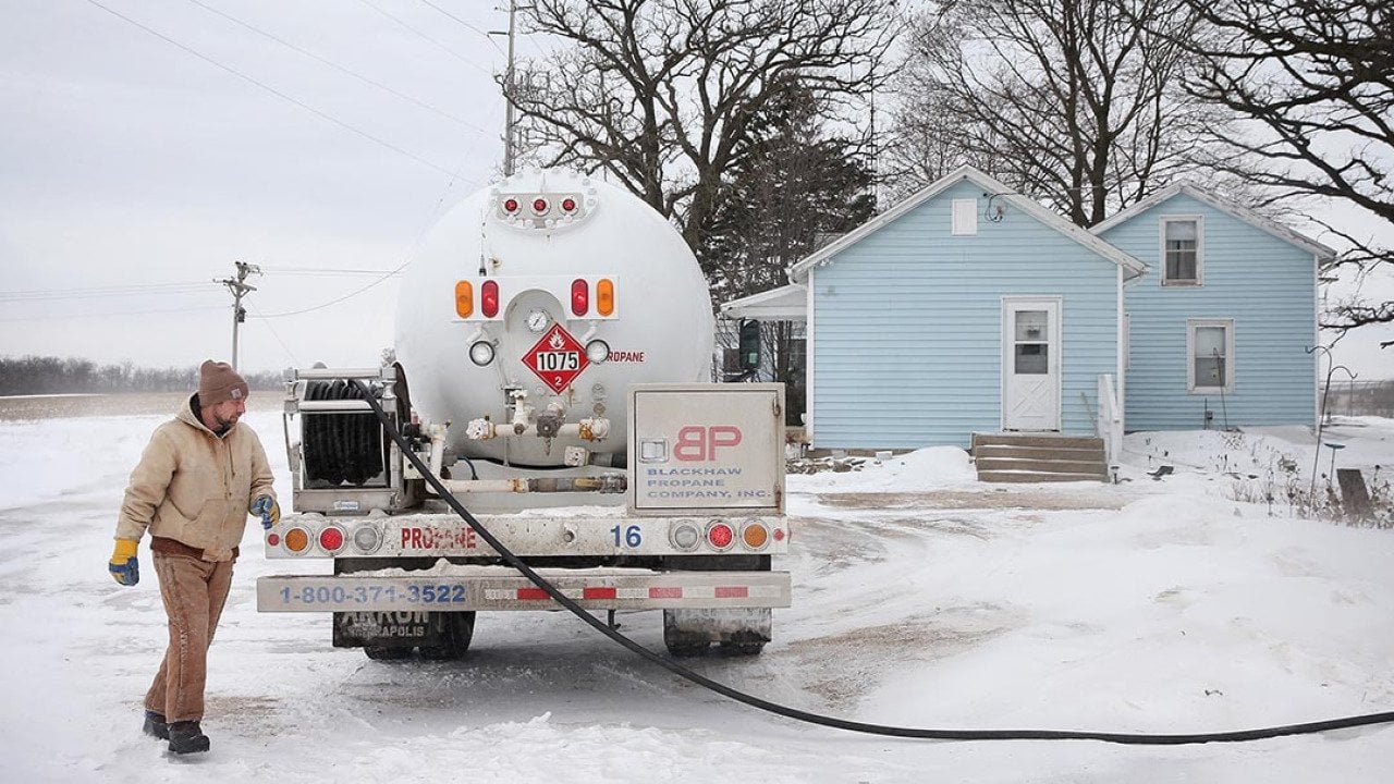 Mark Burger of Blackhawk Propane delivers propane to a rural home on January 24, 2014 near Clinton, Wisconsin.