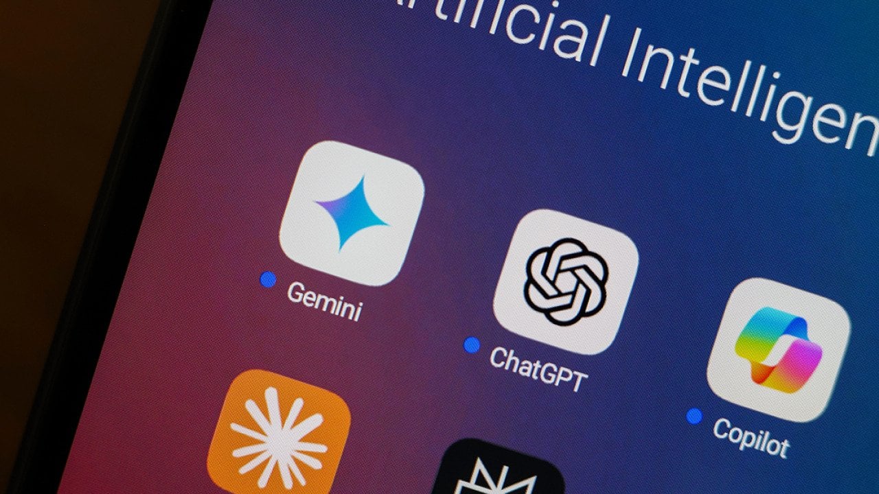 Google Gemini, ChatGPT, Microsoft Copilot, Claude by Anthropic, Perplexity and Bing apps displayed in an app folder on a smartphone.