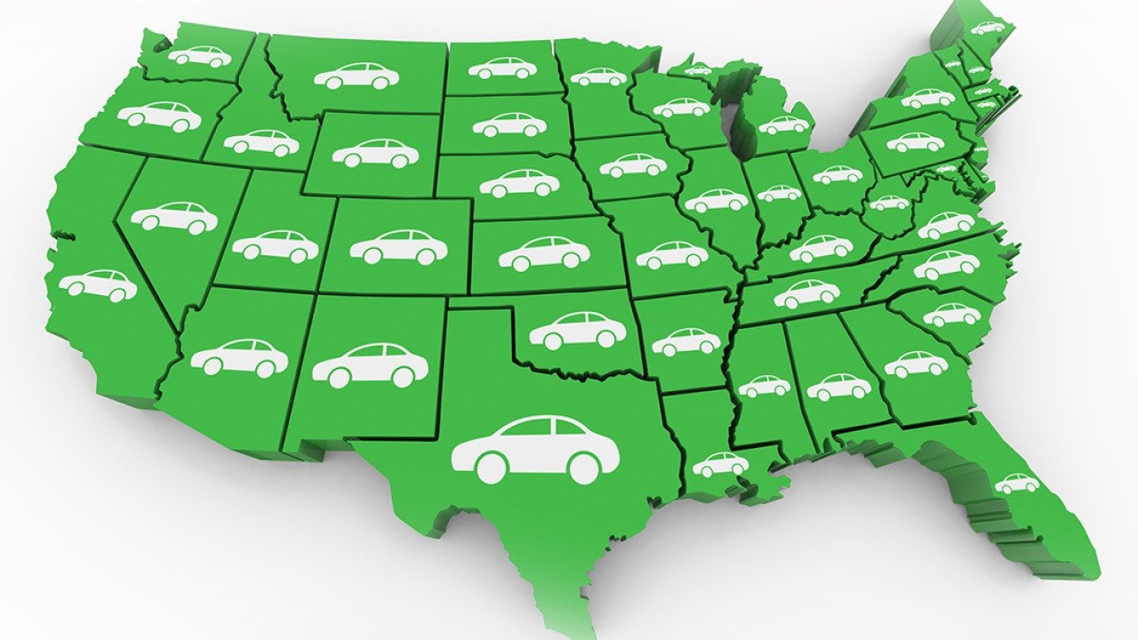 Illustration of the US map with an icon of a car on each state.