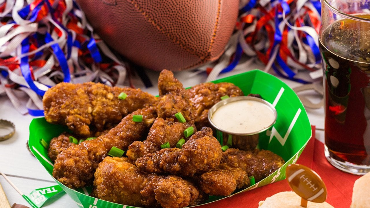 A plate of buffalo chicken wings for a football game day.