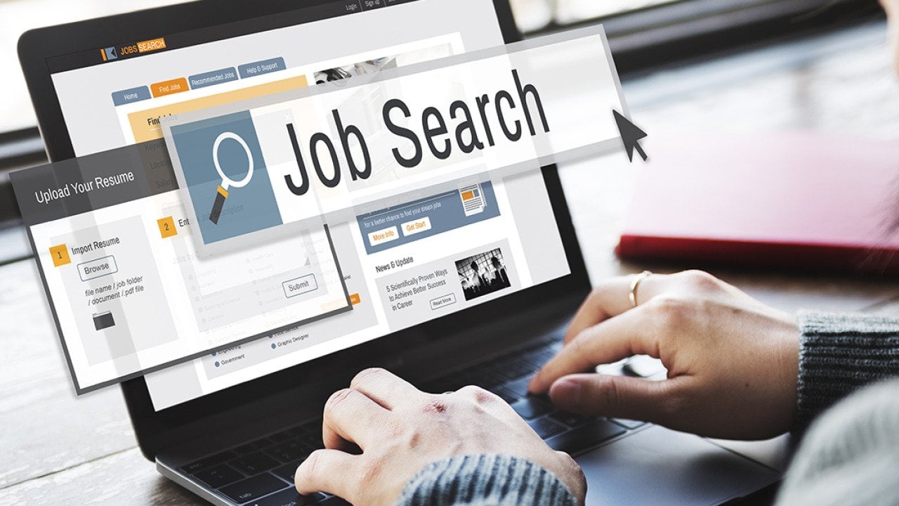 Job search display and graphics coming out of a person using a laptop.