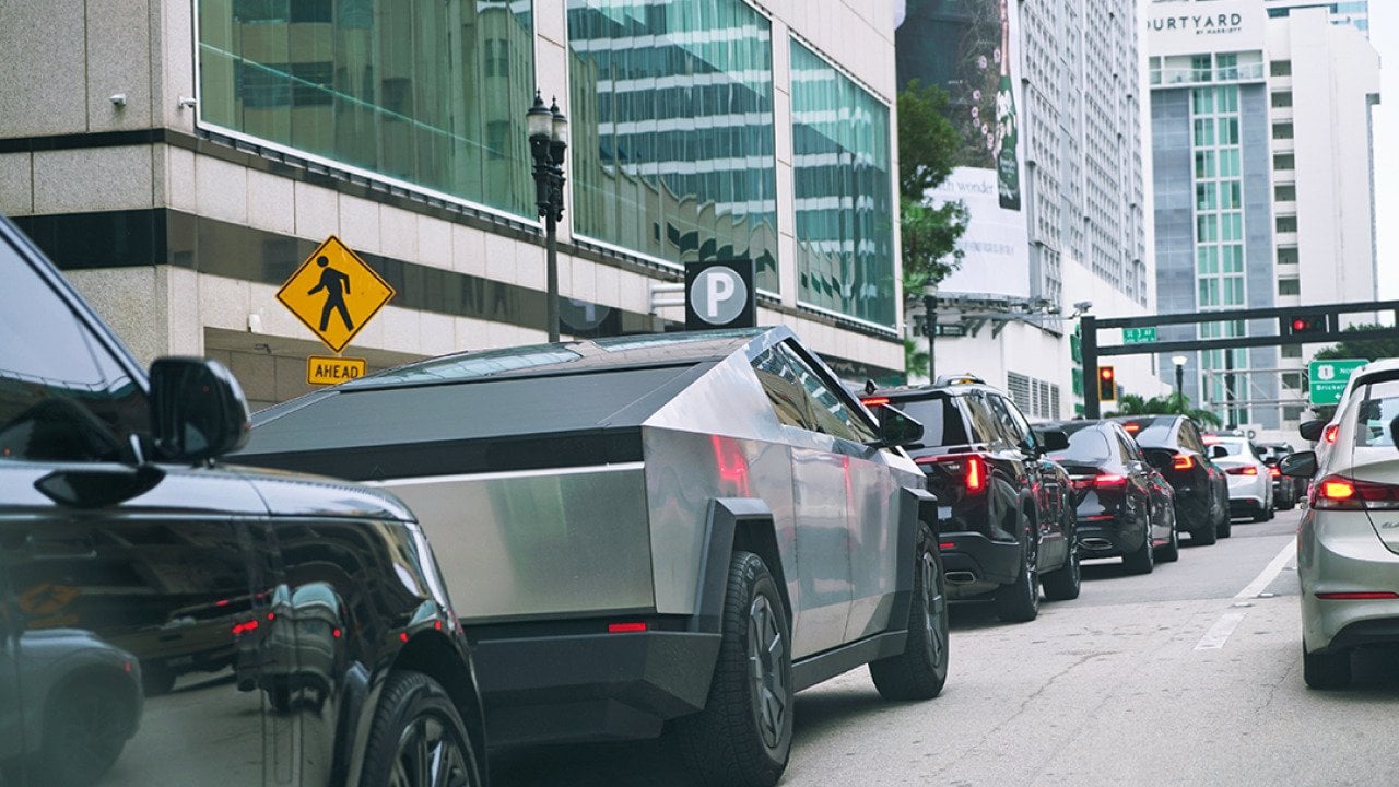 A Tesla Cybertruck stuck in a traffic in downtown Miami.