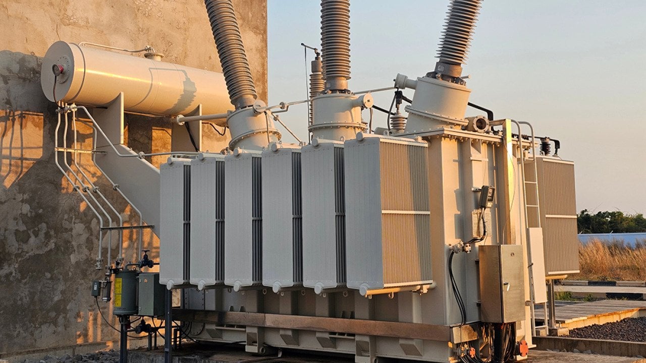 A three-phase 115kV power transformer.