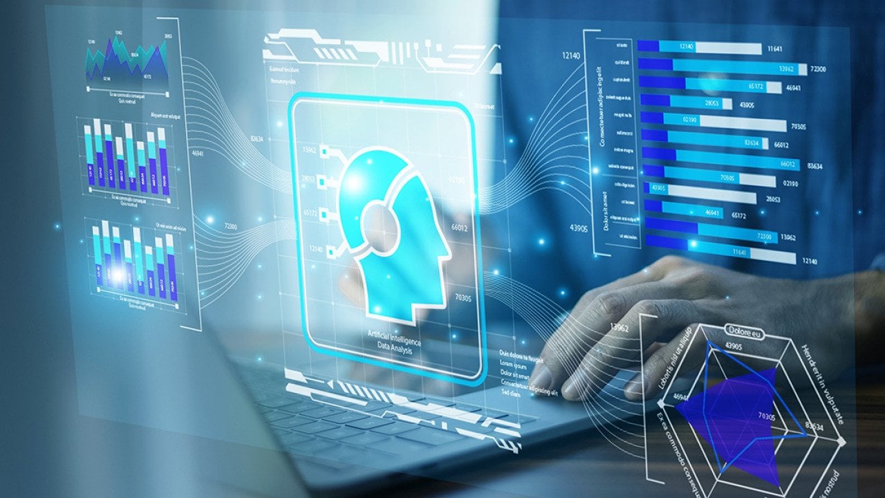 A businessman using AI-powered CRM technology on a laptop.