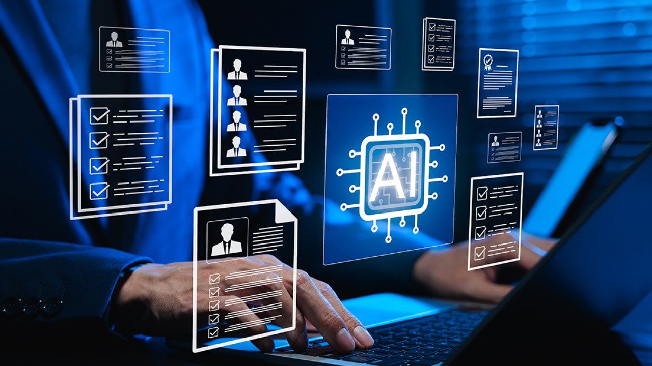 Businessman using a laptop illustrated with AI-powered software graphics.