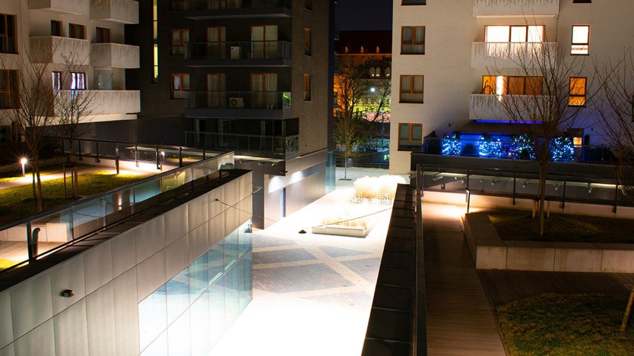 A modern residential complex at night in Wroclaw, Poland.